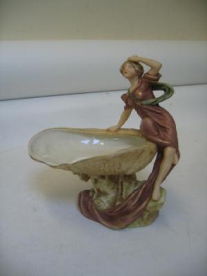 Appraisal: A ROYAL DUX PORCELAIN FIGURAL DISH early th century modelled