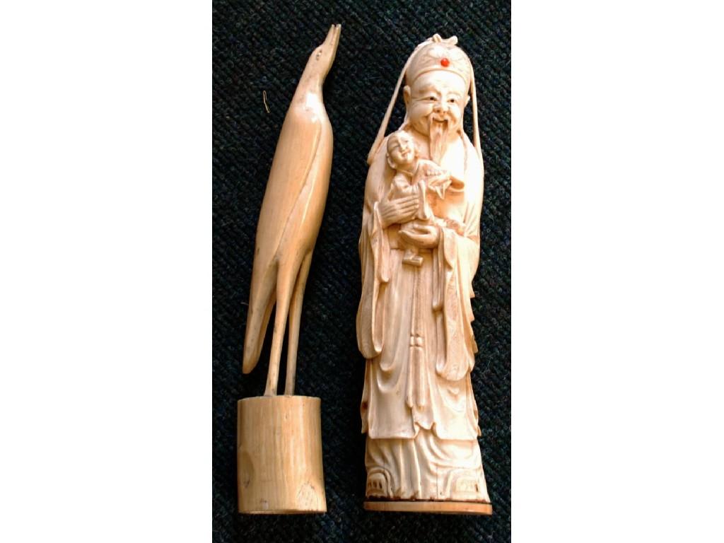 Appraisal: JAPANESE MEIJI PERIOD CARVED IVORY OKIMONO modelled as a Deity