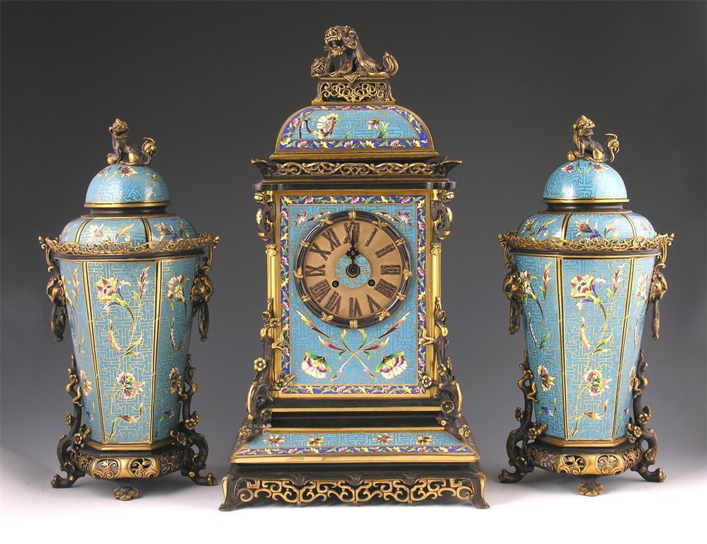 Appraisal: A cloisonne clock garniture