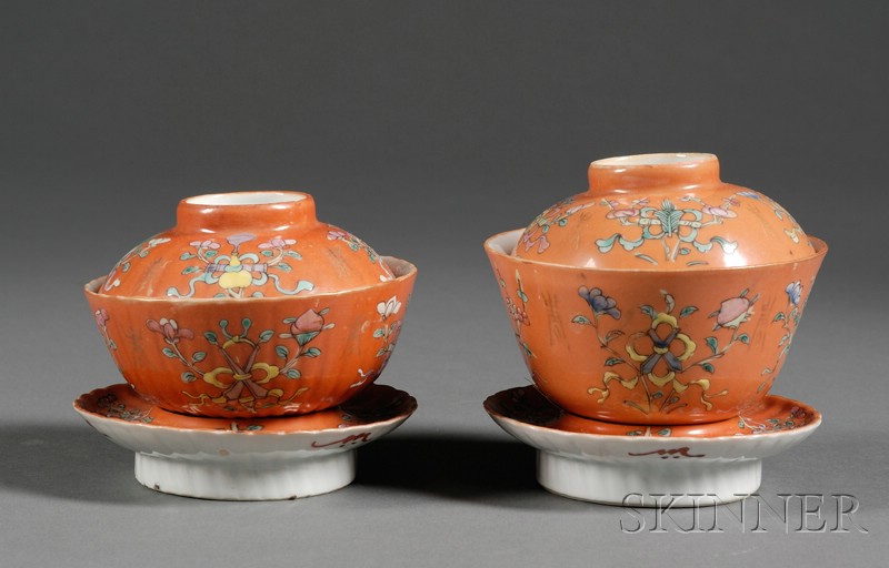 Appraisal: Pair of Porcelain Covered Cups and Stands lobated bodies orange