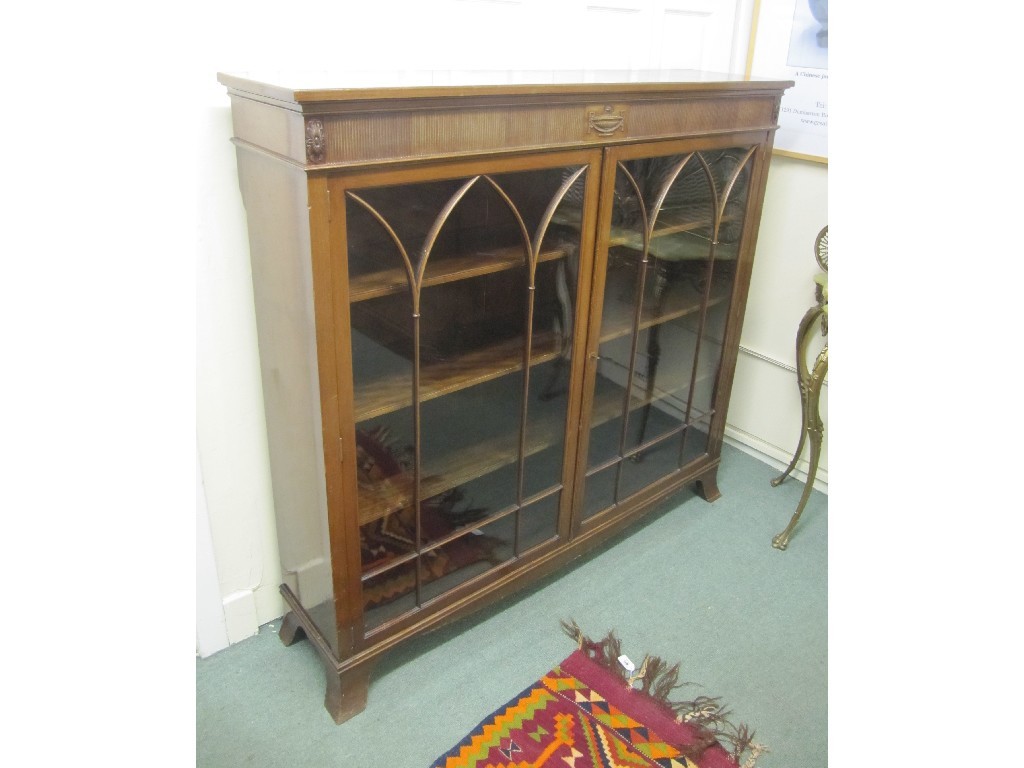 Appraisal: Mahogany glazed two door bookcase with pointed astragal doors