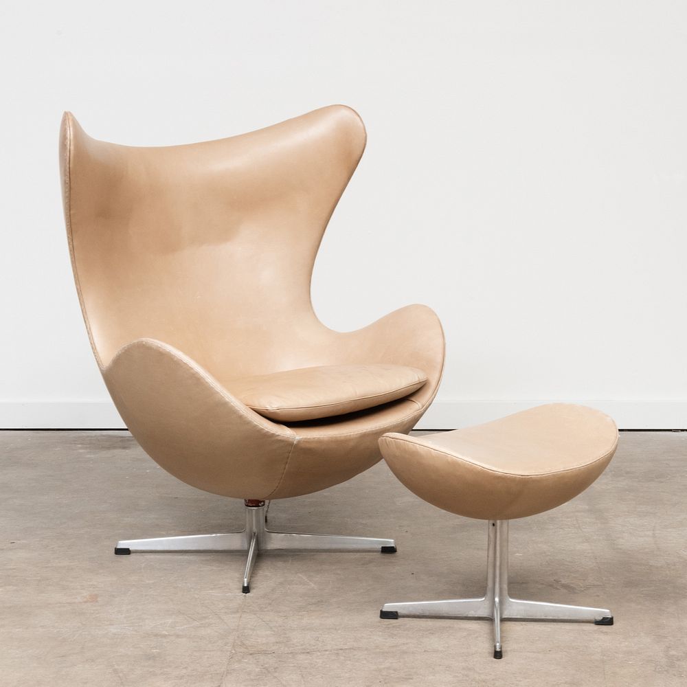 Appraisal: Arne Jacobsen Aluminum and Leather 'Egg' Chair with Ottoman The