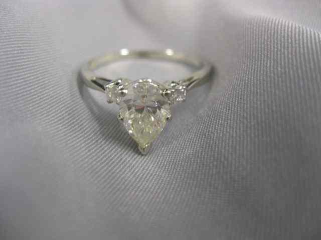 Appraisal: Diamond Ring carat pear shape with round diamond on each