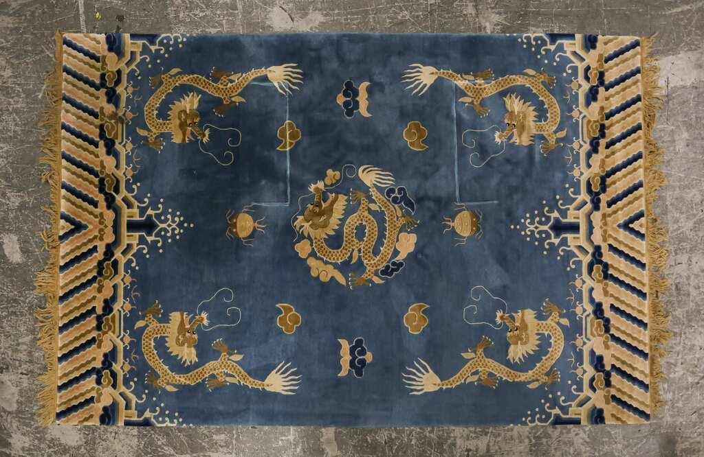 Appraisal: Chinese dragon rug dragons cloud motifs Fraying to fringe indentation