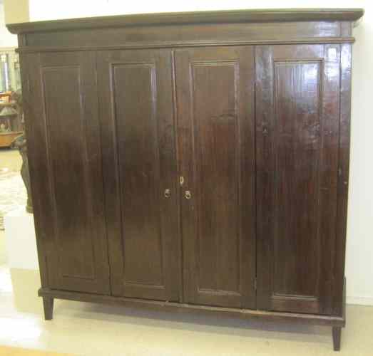 Appraisal: PRIMITIVE FOUR-DOOR STORAGE CABINET th century elements having pairs of