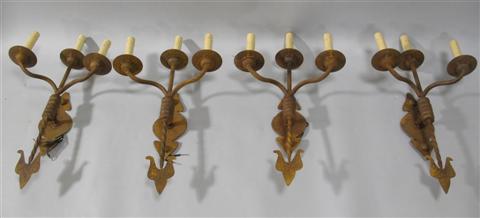 Appraisal: PAIR OF RENAISSANCE STYLE THREE-LIGHT SCONCES Three scrolling arms issuing