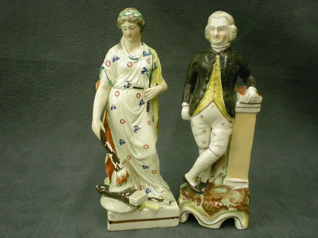 Appraisal: Two Staffordshire figurines including Jean Jacques Rousseau on a rococo