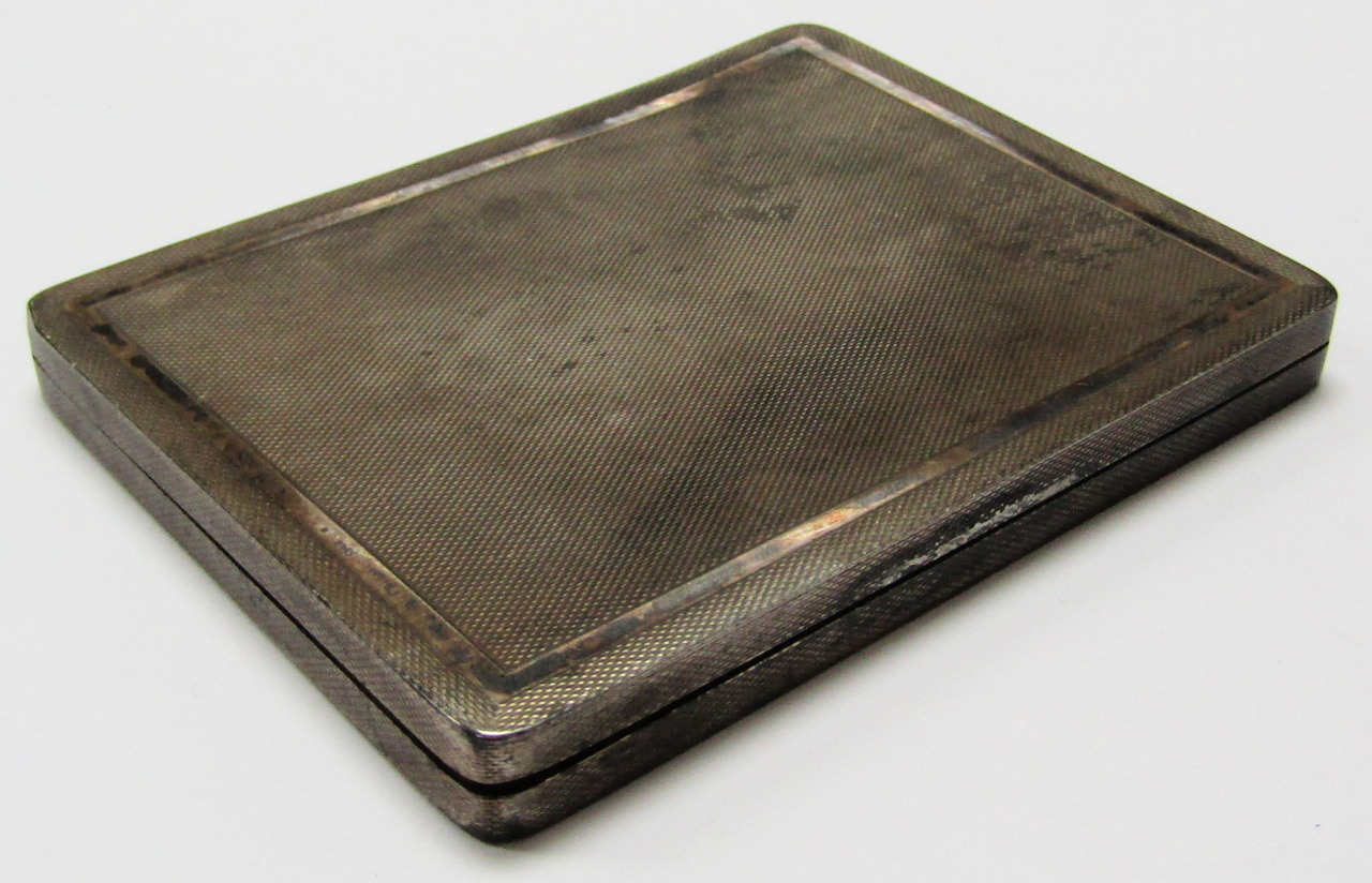 Appraisal: A George VI silver cigarette case by WH Manton with