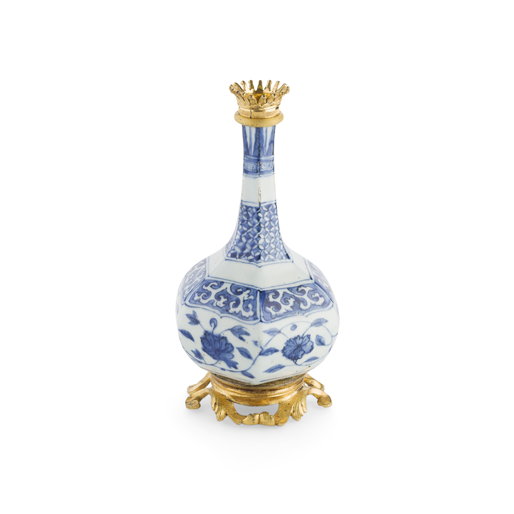 Appraisal: HEXAGONAL BLUE AND WHITE VASE WITH GILT MOUNTS LATE MING