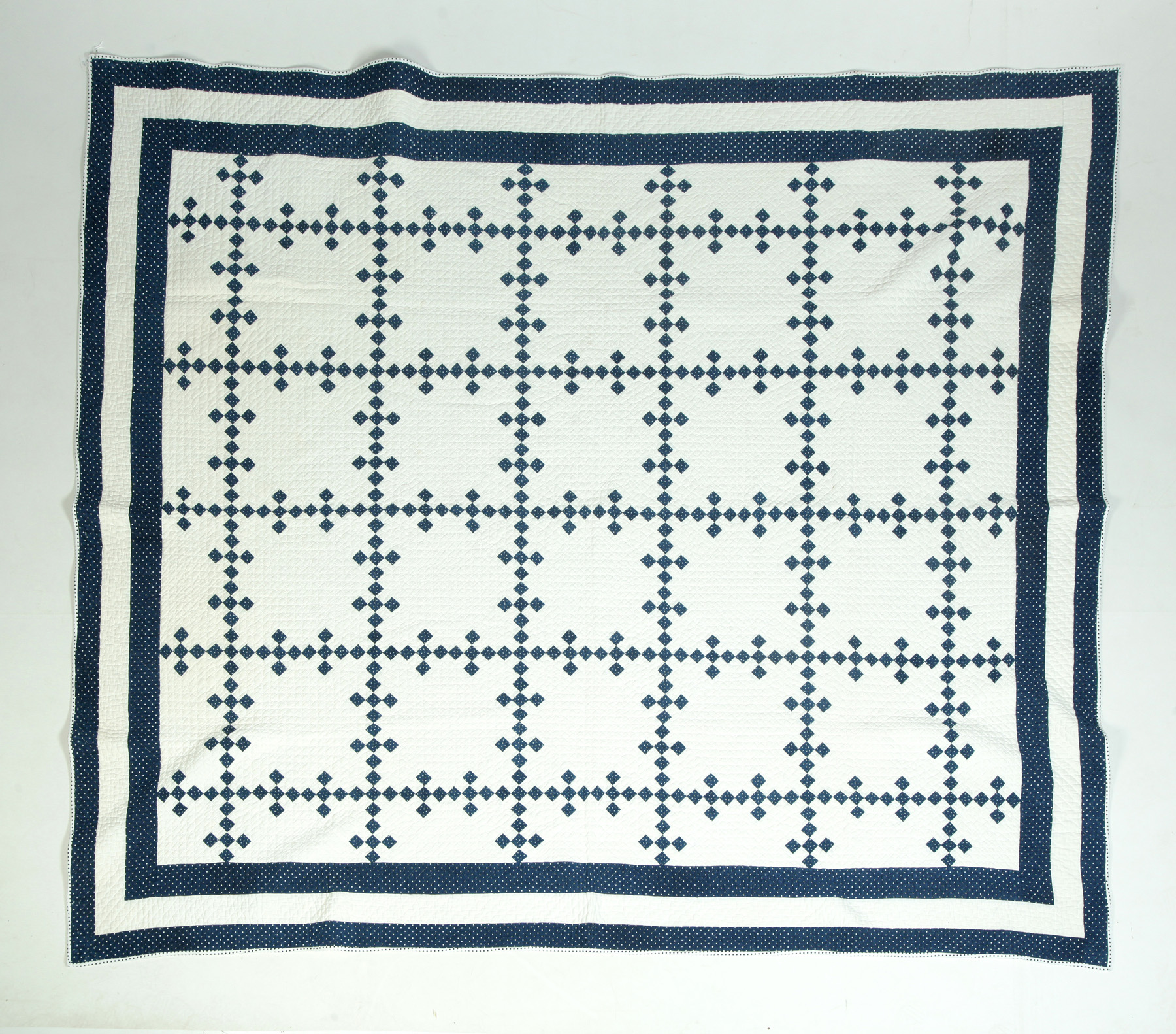 Appraisal: HAND STITCHED NAVY AND WHITE POSTAGE STAMP IRISH CHAIN PATTERN