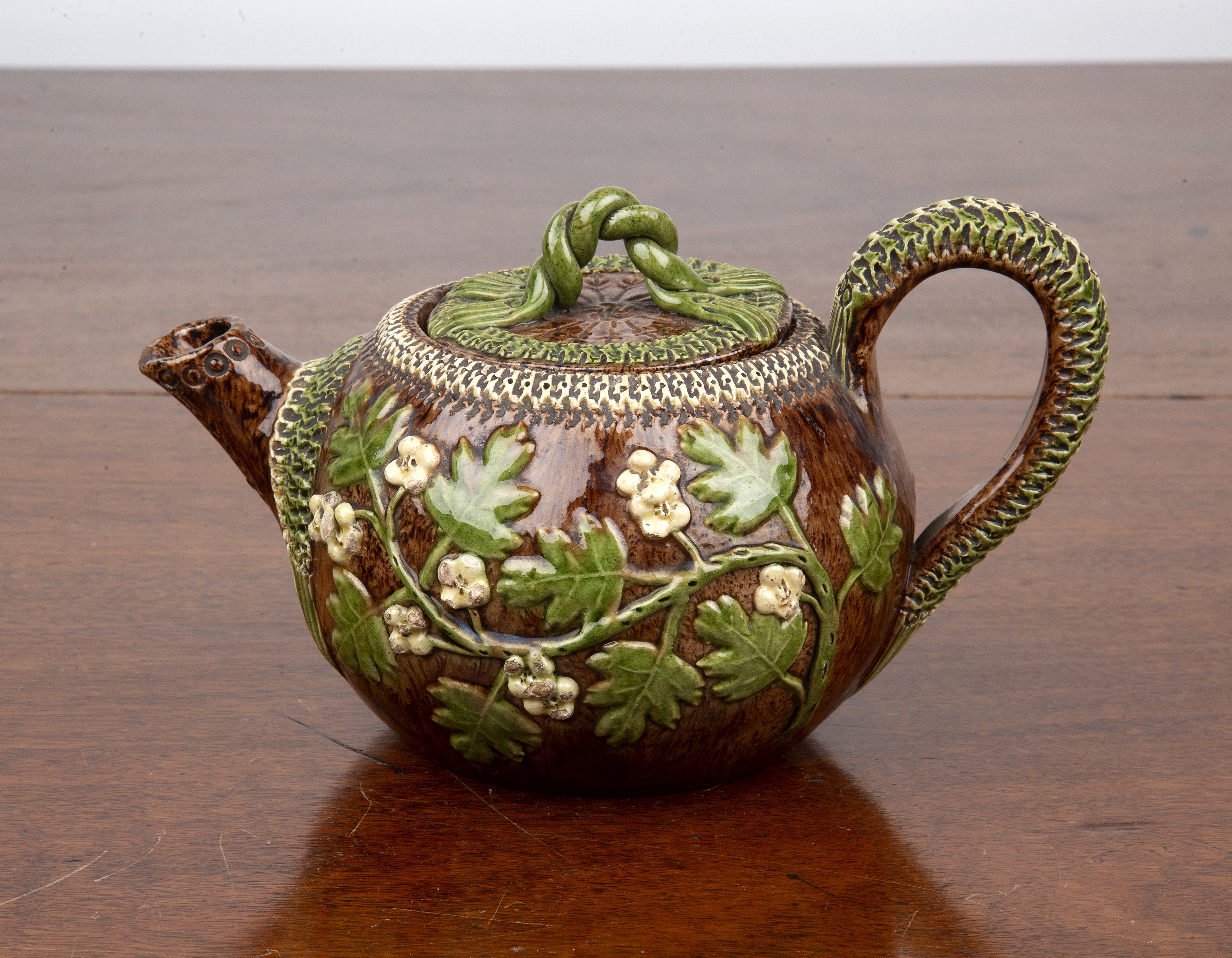 Appraisal: Rye pottery Bellevue hop ware teapot and cover th Century