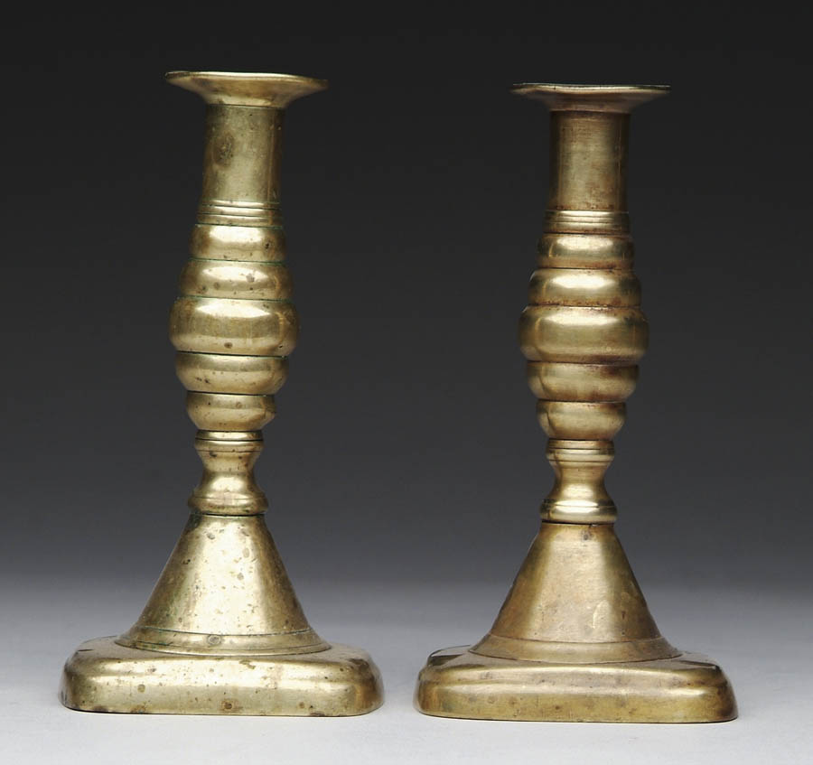 Appraisal: PAIR OF BRASS QUEEN ANNE CANDLESTICKS Rounded corner bases have