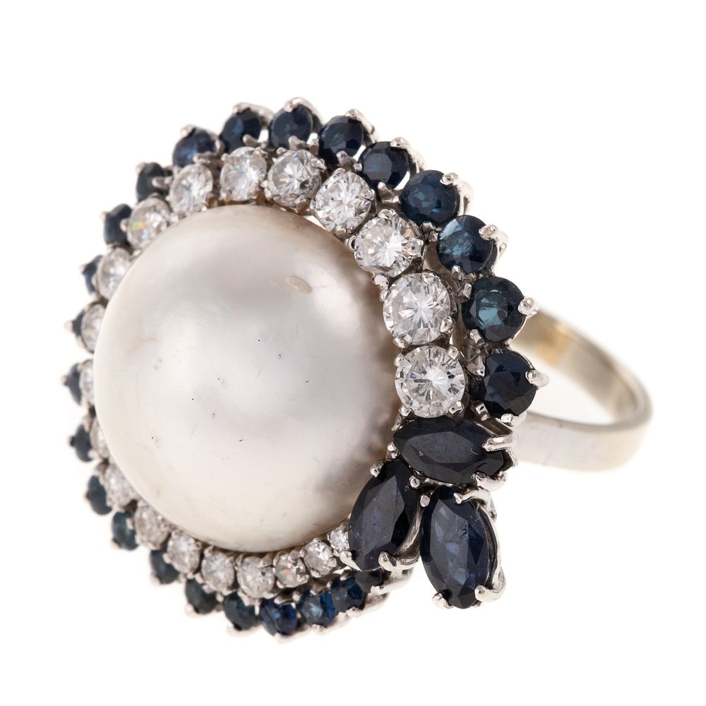 Appraisal: A Mabe Pearl Diamond Sapphire Ring in K K white