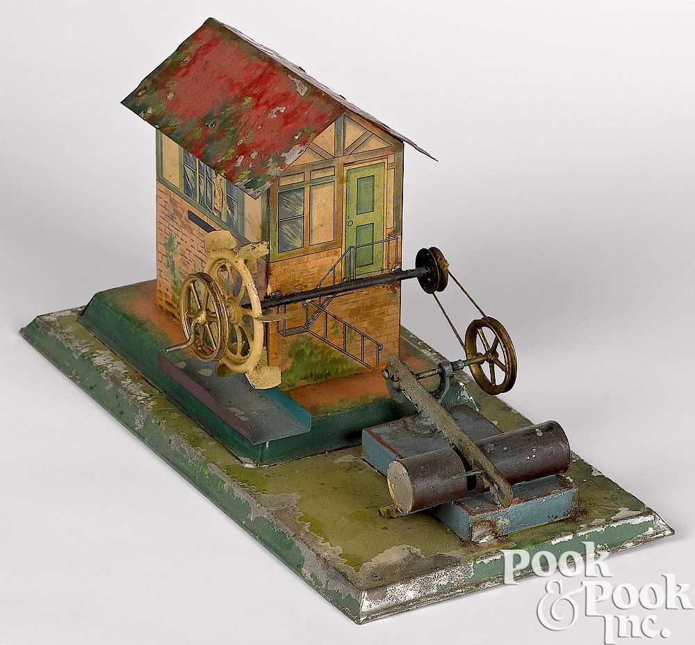 Appraisal: Sawmill steam toy accessory Painted and lithographed tin sawmill steam