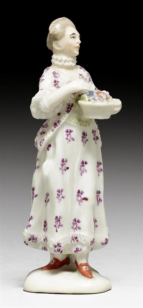 Appraisal: MINIATURE FIGURE OF A GARDNER AS AN ALLEGORY OF 'SPRING'