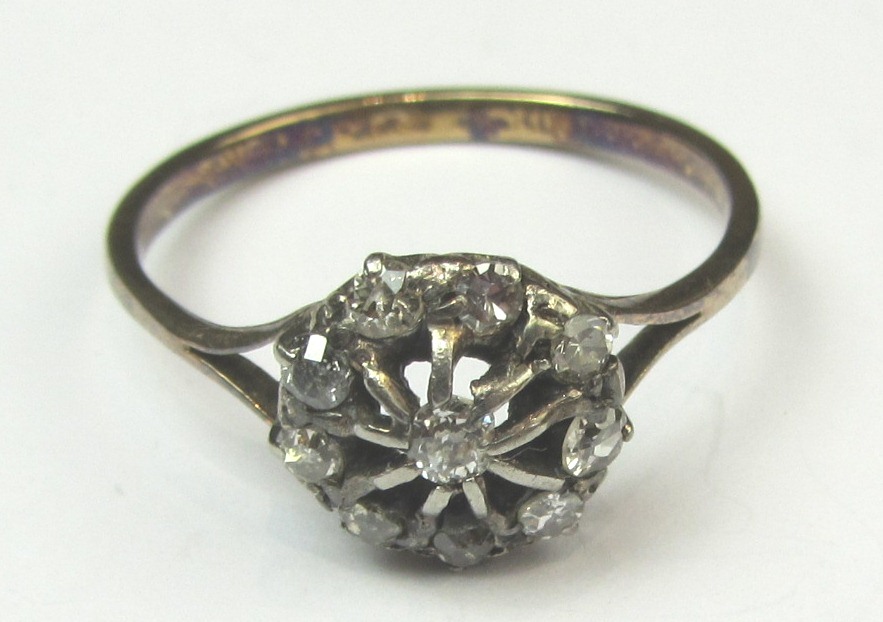 Appraisal: A diamond set cluster ring mounted with a cushion shaped