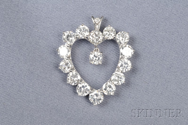 Appraisal: kt White Gold and Diamond Heart Pendant prong-set with full-cut