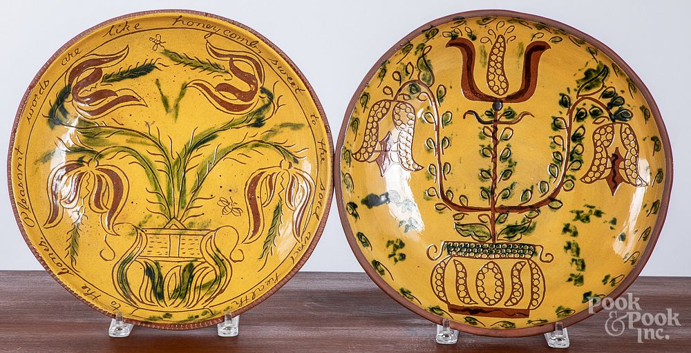 Appraisal: Two Breininger sgraffito redware chargers Two Breininger sgraffito redware chargers