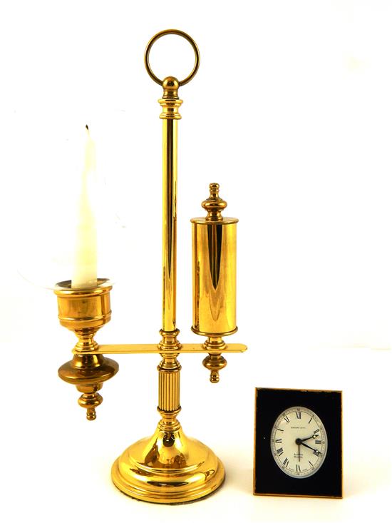 Appraisal: Tiffany Co travel alarm clock and brass candlestick holder Tiffany