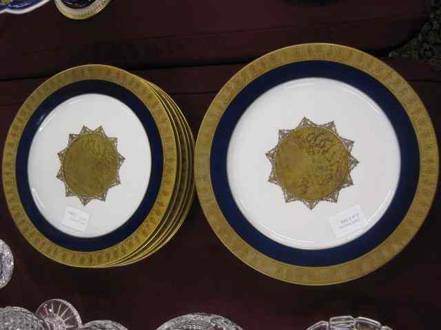 Appraisal: Set of Gold Encrusted Porcelain Plates cobalt trim Greco-Roman medallions