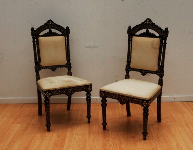 Appraisal: A pair of Colonial ivory inlaid ladies chairs Anglo-Indian chairs