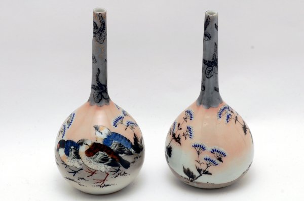 Appraisal: Pair of Japanese porcelain stick vases with handpainted and enameled