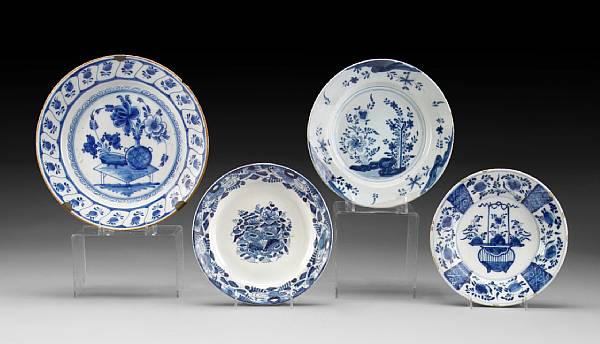 Appraisal: A group of four blue and white Dutch Delftware plates