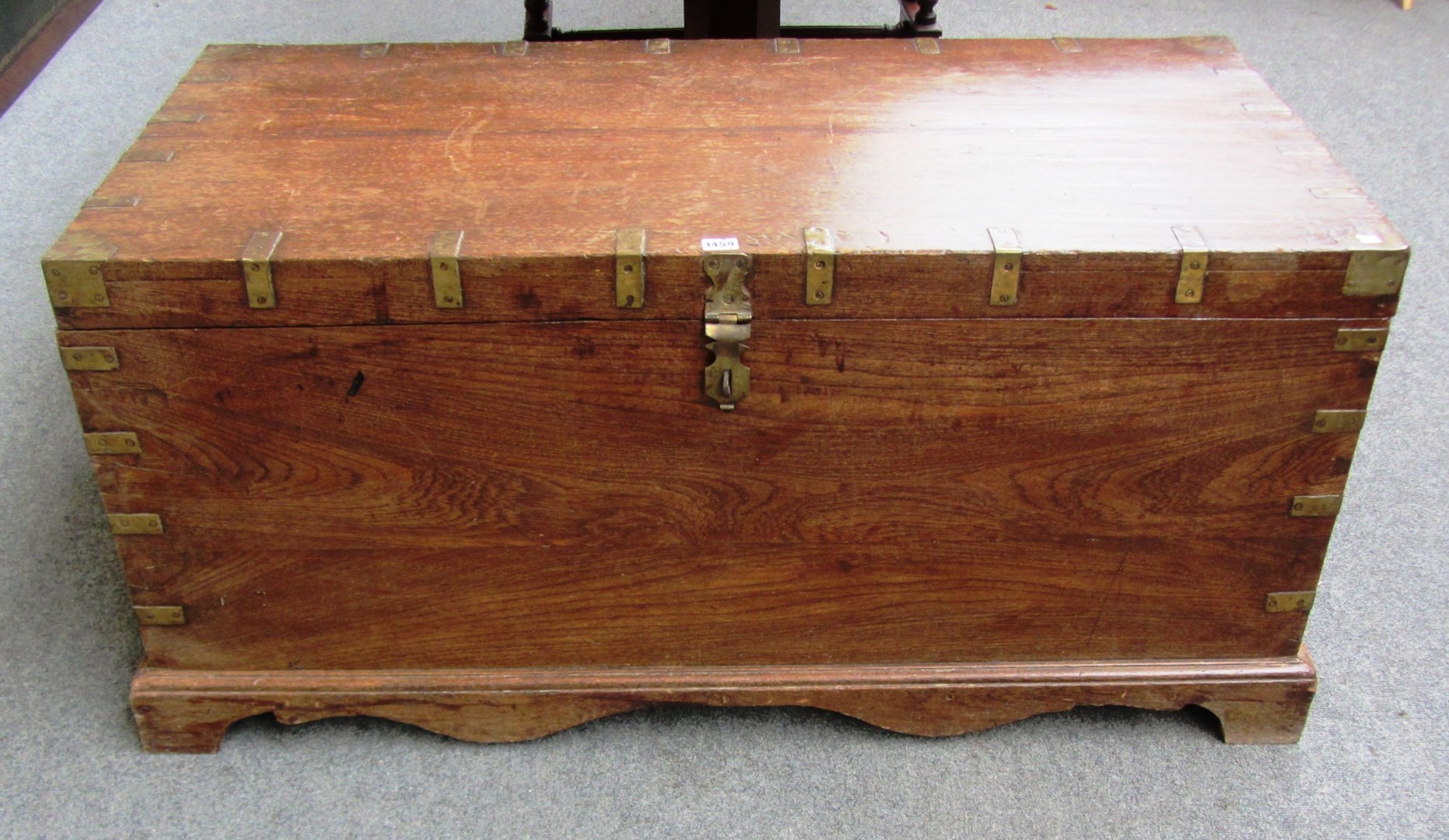 Appraisal: A th century metal bound Indian teak rectangular trunk on