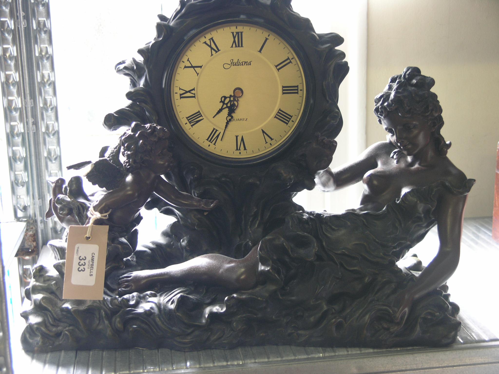 Appraisal: An Art Nouveau-style patinated bronze mantel clock quartz movement classical