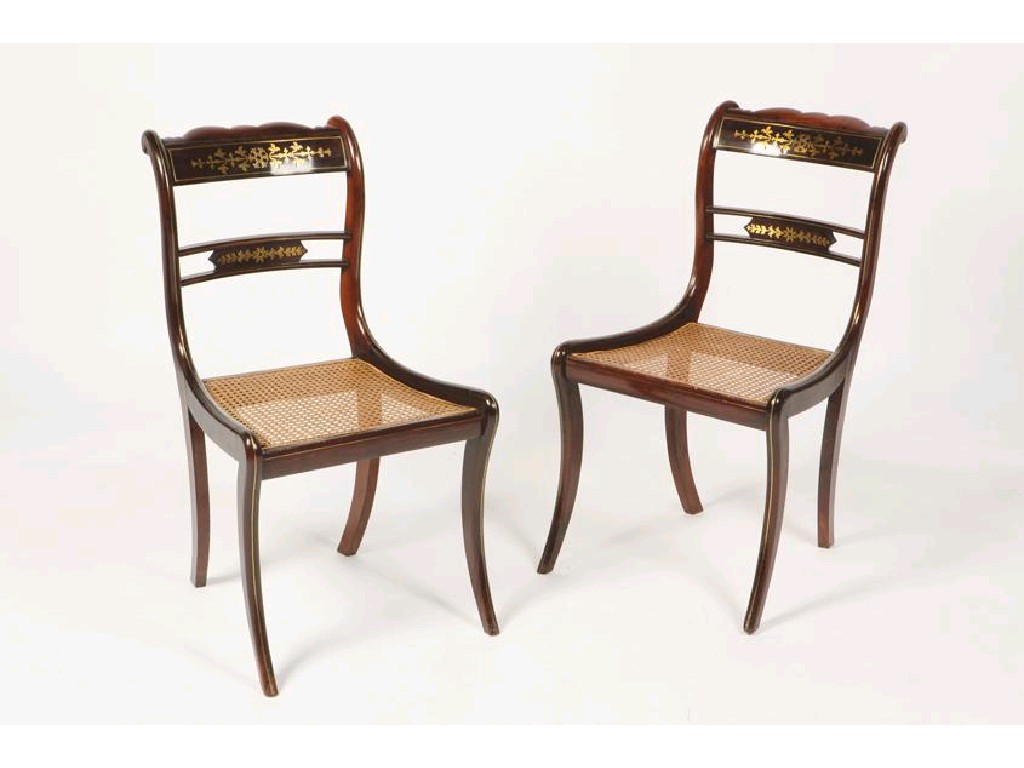 Appraisal: A PAIR OF REGENCY ROSEWOOD AND BRASS INLAID DINING CHAIRS