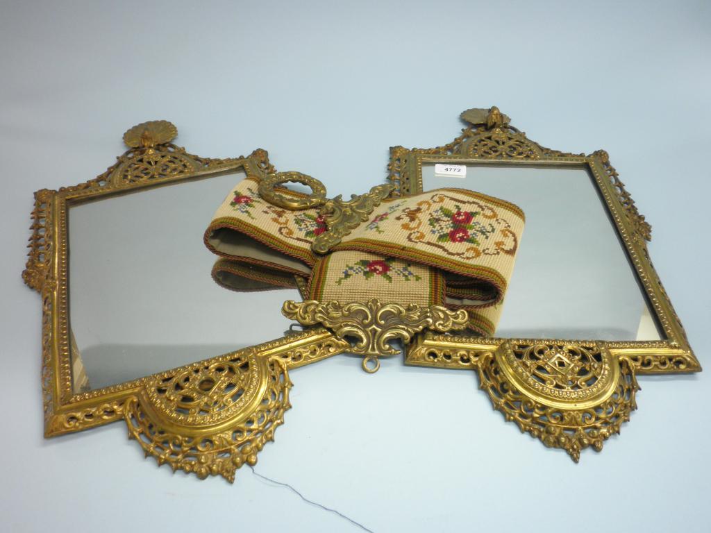 Appraisal: A pair of Continental gilt wood wall mirrors each with