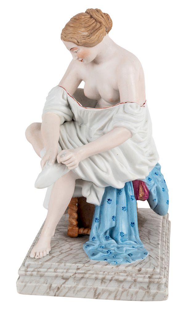 Appraisal: A RUSSIAN PORCELAIN FIGURE OF A WOMAN ADJUSTING HER HOISERY