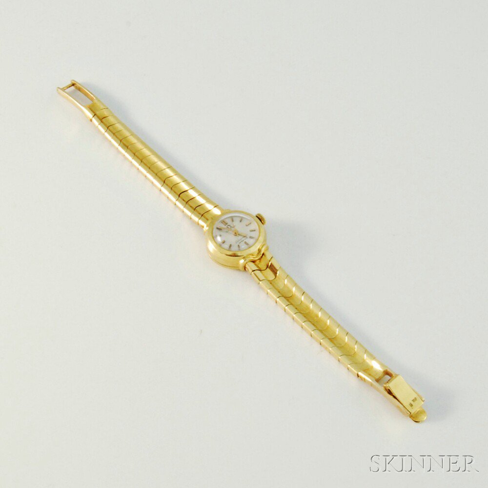 Appraisal: kt Gold Omega Lady's Wristwatch Ladymatic with kt bracelet retailed