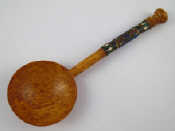 Appraisal: A Russian spalted birch spoon with cloisonne silver mounted handle