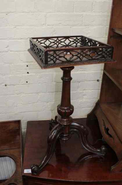 Appraisal: A VICTORIAN TRIPOD OCCASIONAL TABLE with rosewood scrolling legs the