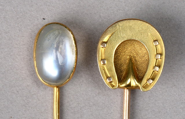 Appraisal: A MOONSTONE SET STICK PIN oval moonstone mounted in a