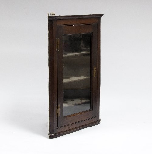 Appraisal: An th Century oak hanging corner cupboard with glass panelled