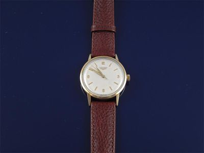 Appraisal: A gold wrist watch by Borgines Sweep seconds hand Associated