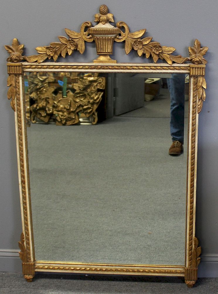 Appraisal: Gilt Wooden Mirror With Urn Crest Decorative mirror with floral