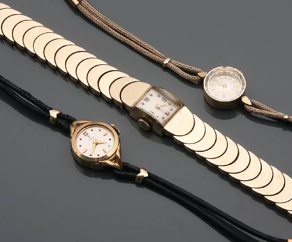 Appraisal: A collection of three gold ladies wristwatches including Rolex Tudor