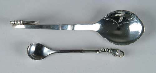 Appraisal: TWO PIECES OF GEORGE JENSEN SILVER - curled handled spoon