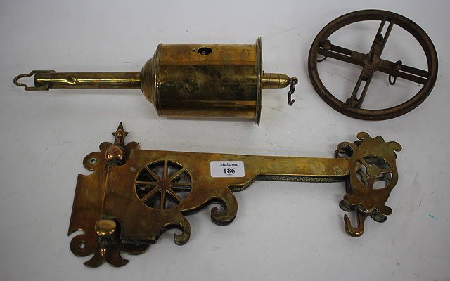 Appraisal: A TH CENTURY POLISHED BRASS ADJUSTABLE WALL MOUNTED BRACKET together