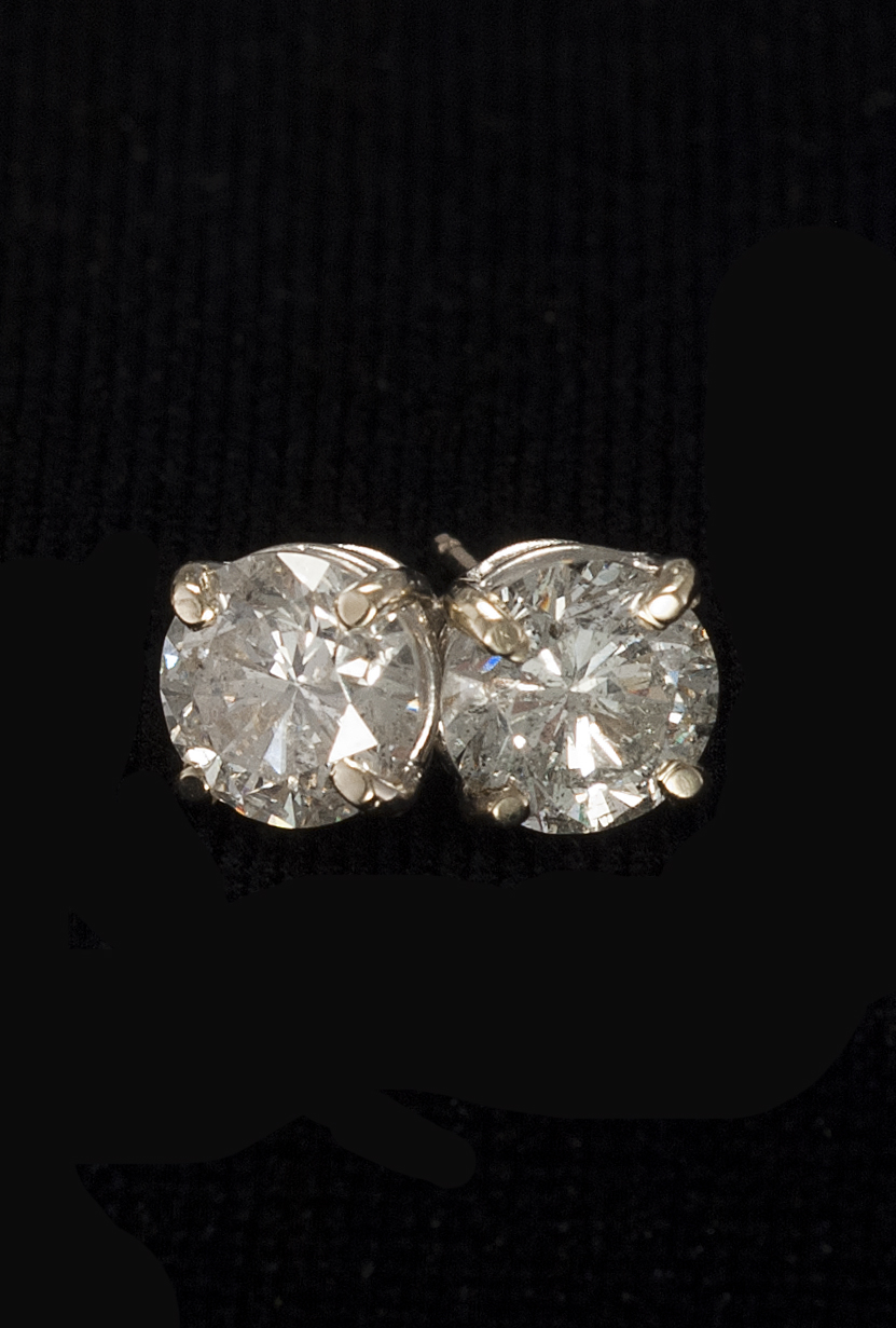 Appraisal: PAIR OF KT WHITE GOLD AND DIAMOND STUD EARRINGS Diamonds