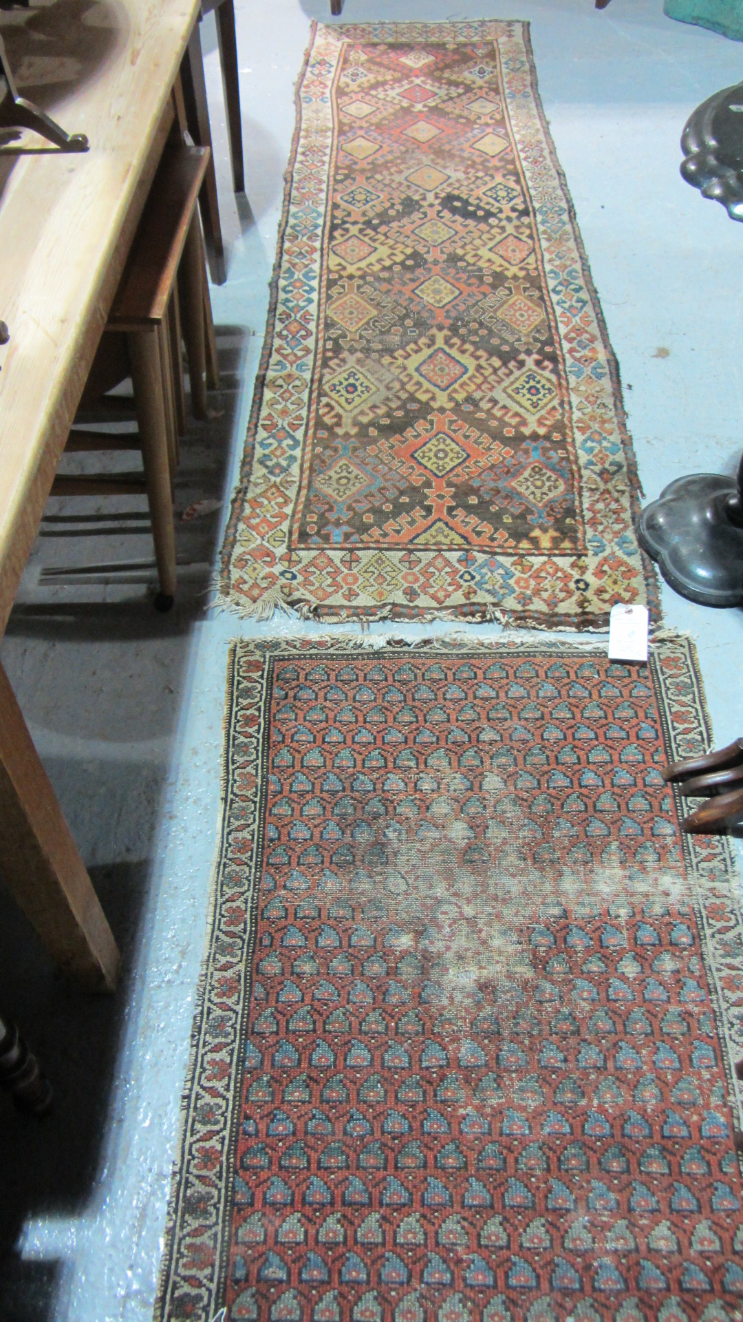 Appraisal: A Caucasian runner and a Hamadan rug