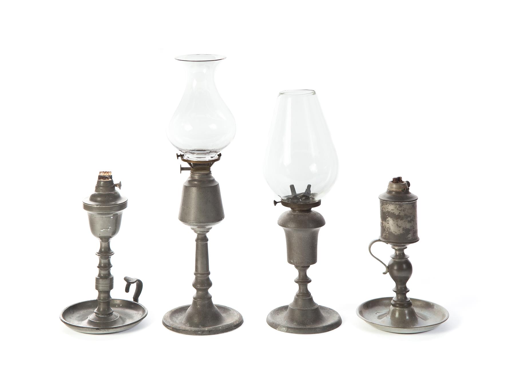 Appraisal: FOUR AMERICAN PEWTER OIL LAMPS First half- th century Two