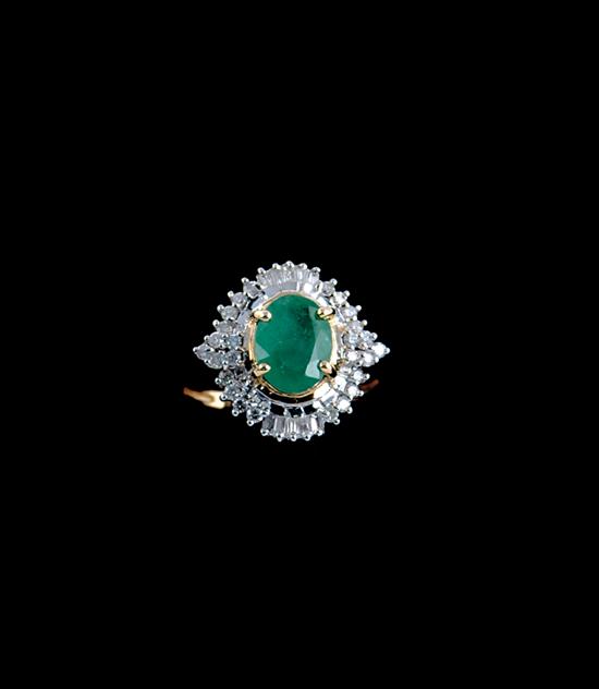 Appraisal: Emerald and diamond ring emerald ct surrounded by diamonds mounted