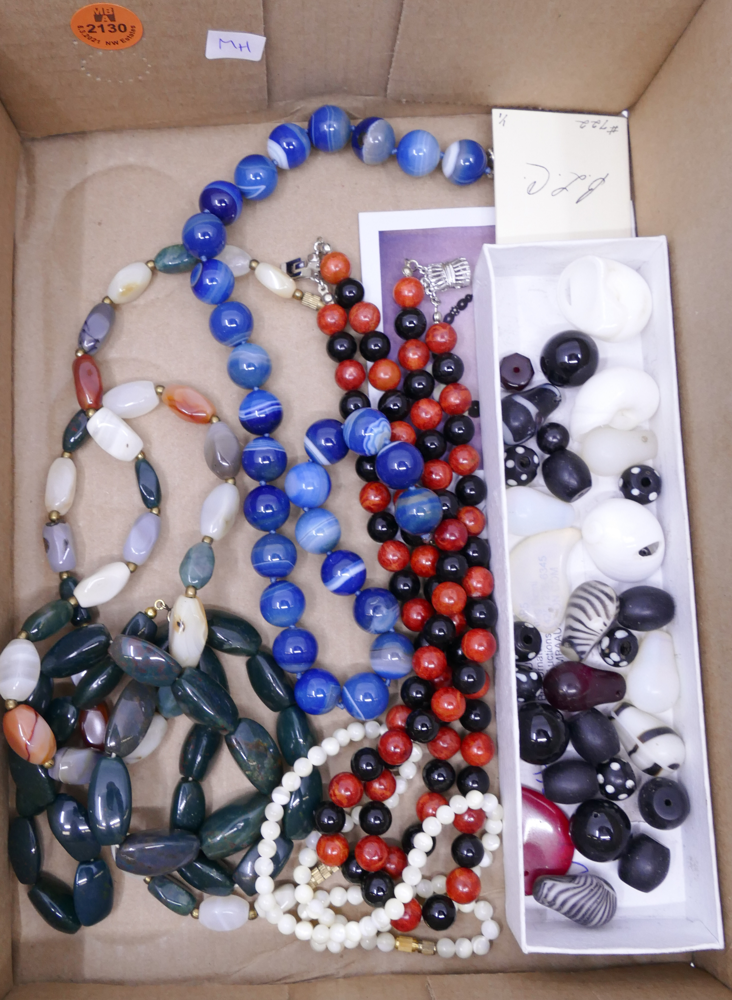 Appraisal: Box Carved Stone Beaded Necklaces