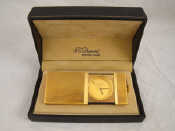 Appraisal: A gilt metal Dupont desk watch with alarm approx cm