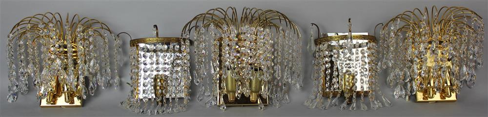 Appraisal: FIVE CRYSTAL SCONCES a set of three sconces with arching