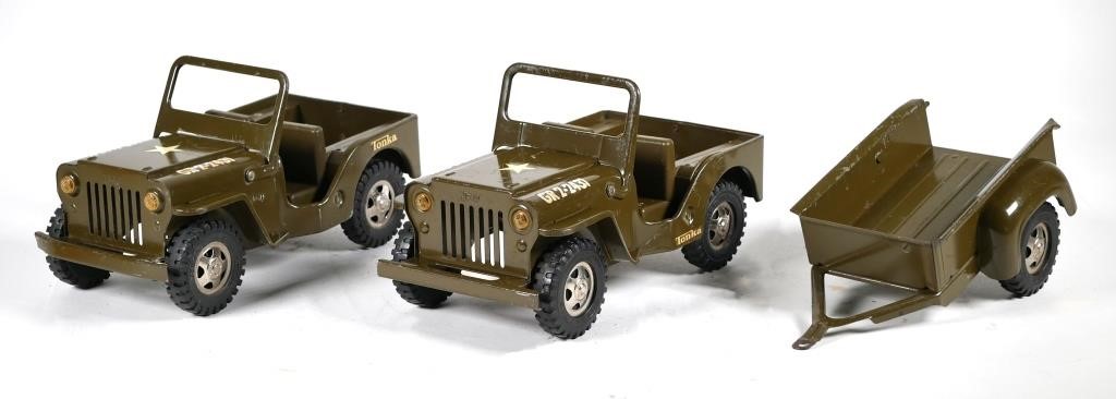 Appraisal: VINTAGE TONKA ARMY JEEPS WITH TRAILERTwo brown toy jeeps GR